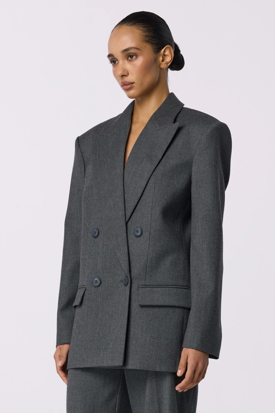 Oversized double-breasted wool blazer with shoulder pads - photo 5