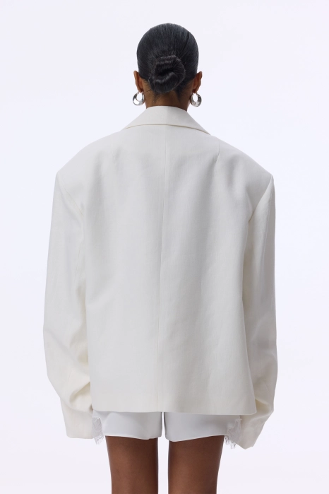 Oversized linen blazer with gathered details on the sleeves