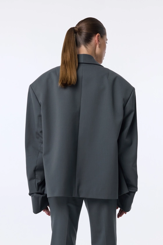 Oversized wool blazer with gathering on the sleeve - photo 5