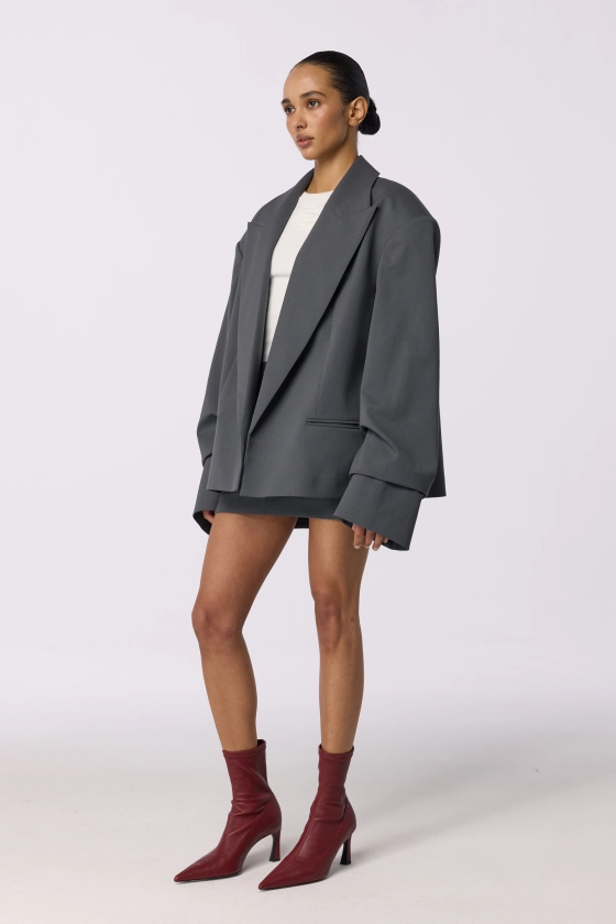 Oversized wool blazer with gathering on the sleeve - photo 8