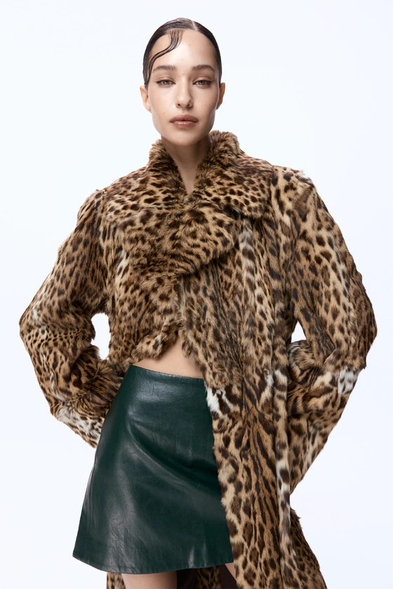 Вінтажна оцелотова шуба 