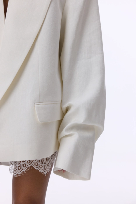 Oversized linen blazer with gathered details on the sleeves