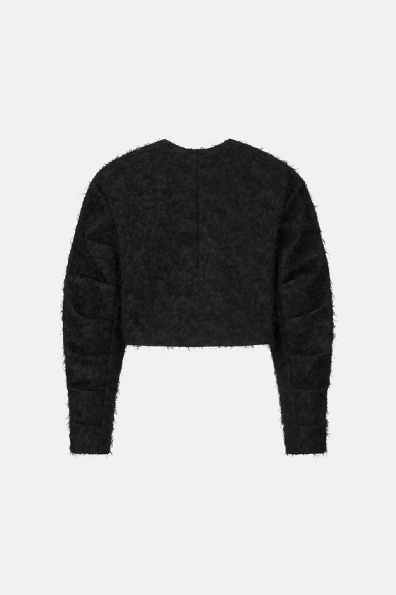 Бомбер пухнастий зі збіркою на рукаві 