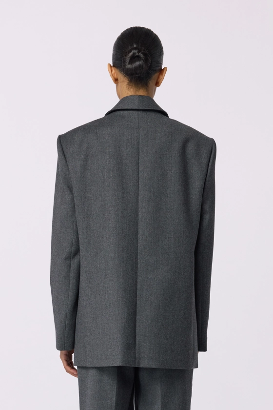 Oversized double-breasted wool blazer with shoulder pads - photo 4