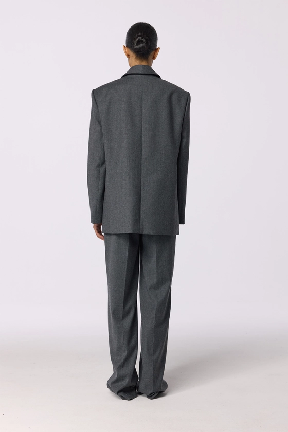 Брюки вовняні на середній посадці зі стрілками 