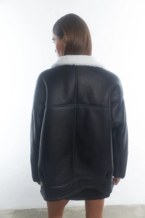 Дублянка оверсайз з накладними карманами 