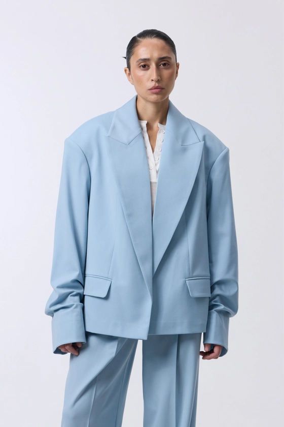 Oversized wool blazer with gathering on the sleeve - photo 3