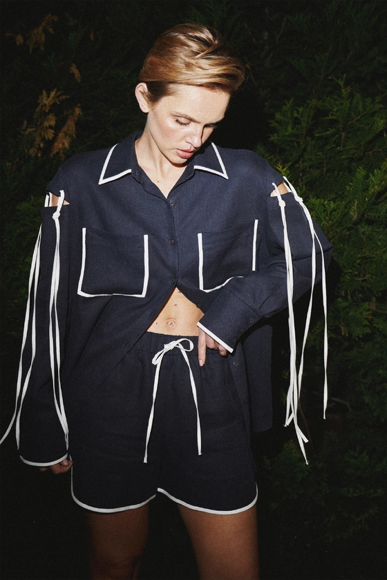 Шорти лляні з молочною окантовкою 