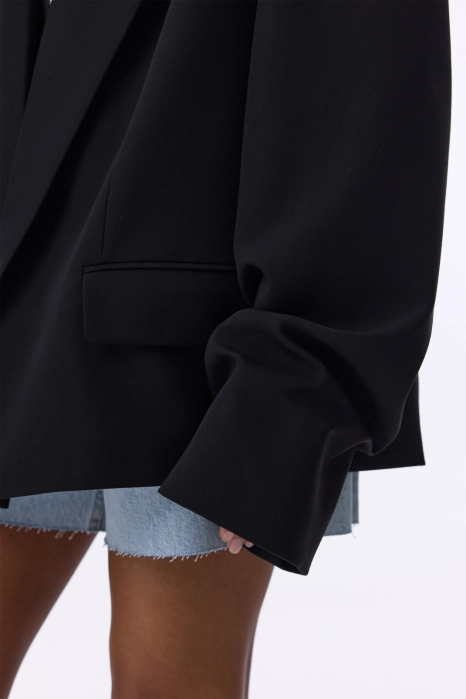 Oversized cotton blazer with gathering on the sleeve