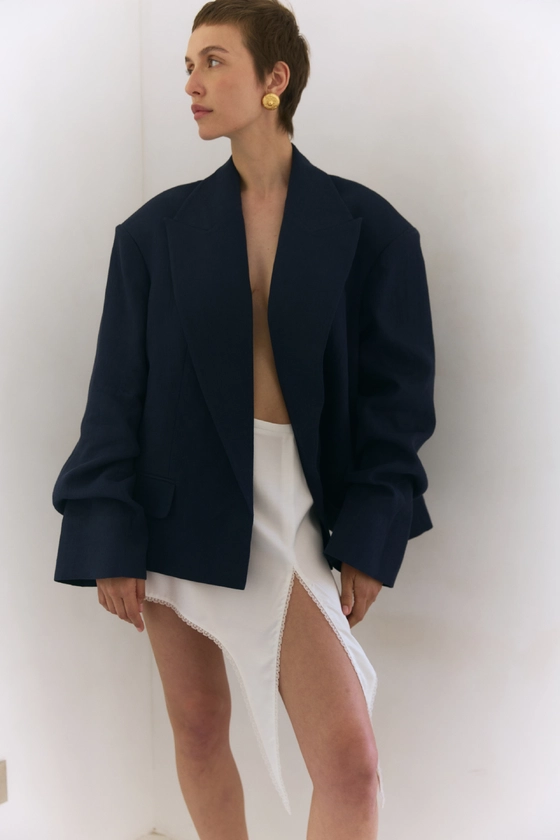 Спідниця міні з розрізом та мереживом 