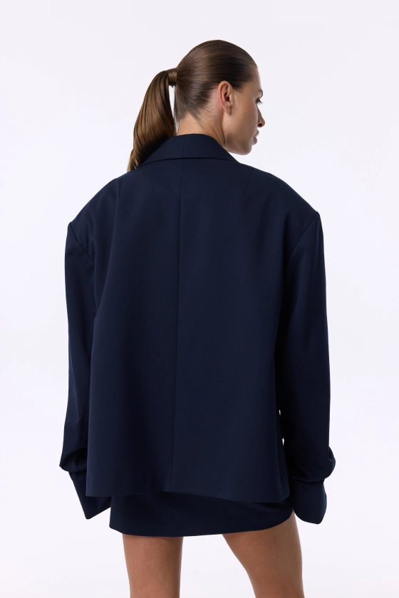 Oversized wool blazer with gathering on the sleeve - photo 4