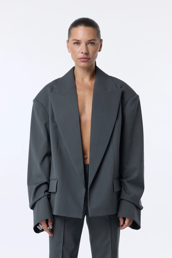 Oversized wool blazer with gathering on the sleeve - photo 3