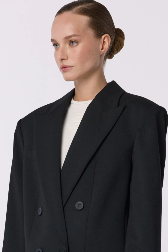 Oversized double-breasted wool blazer with shoulder pads - photo 7