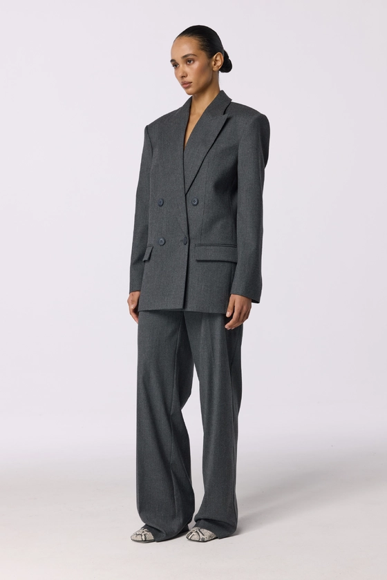 Брюки вовняні на середній посадці зі стрілками 