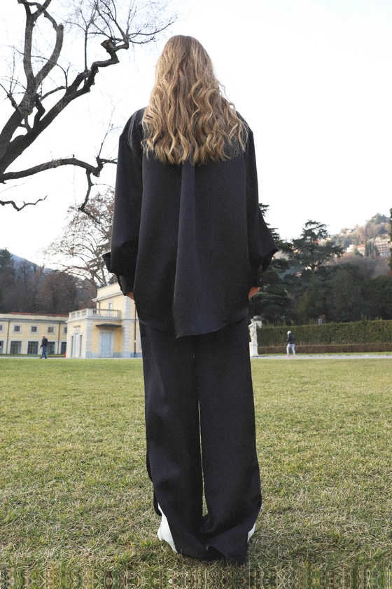 Брюки атласні з розрізами 