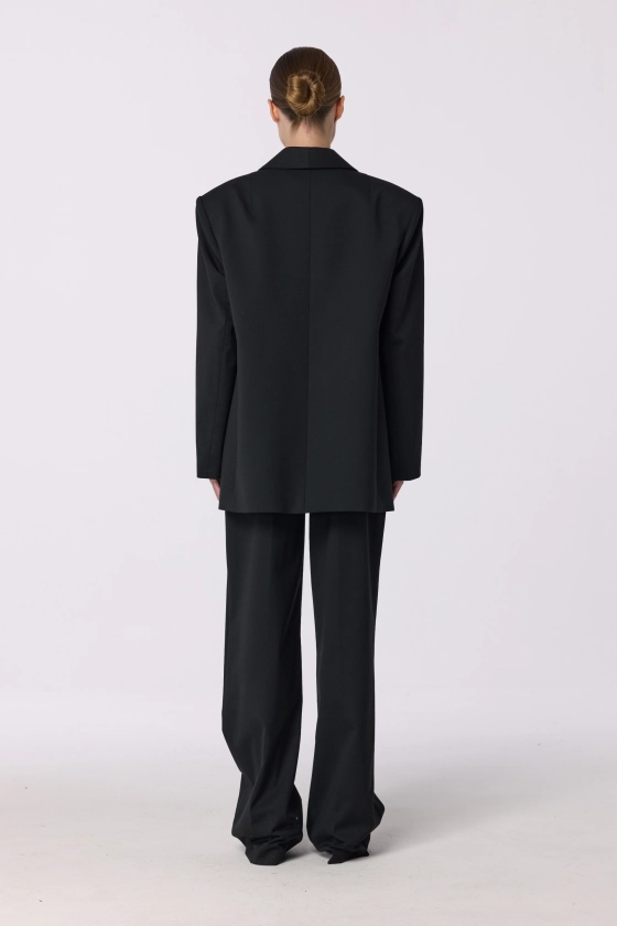 Oversized double-breasted wool blazer with shoulder pads - photo 5