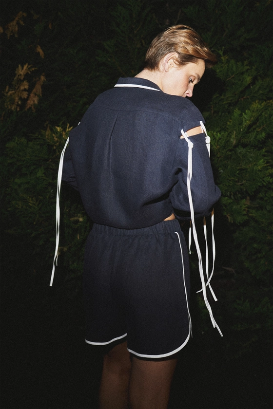 Шорти лляні з молочною окантовкою 