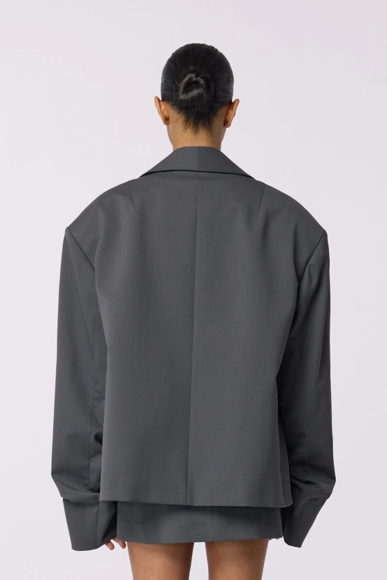Oversized wool blazer with gathering on the sleeve - photo 6