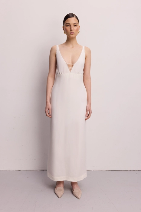 Сукня міді з глибоким вирізом та мереживом