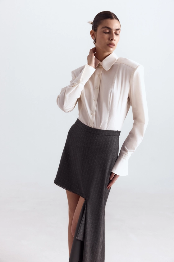 Спідниця вовняна міні з відрізаною деталлю 