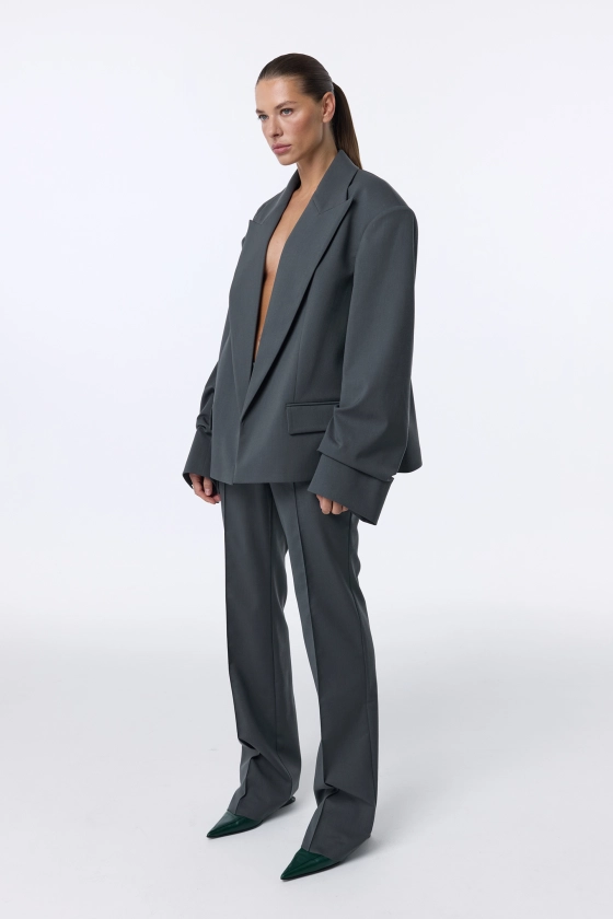 Oversized wool blazer with gathering on the sleeve - photo 7